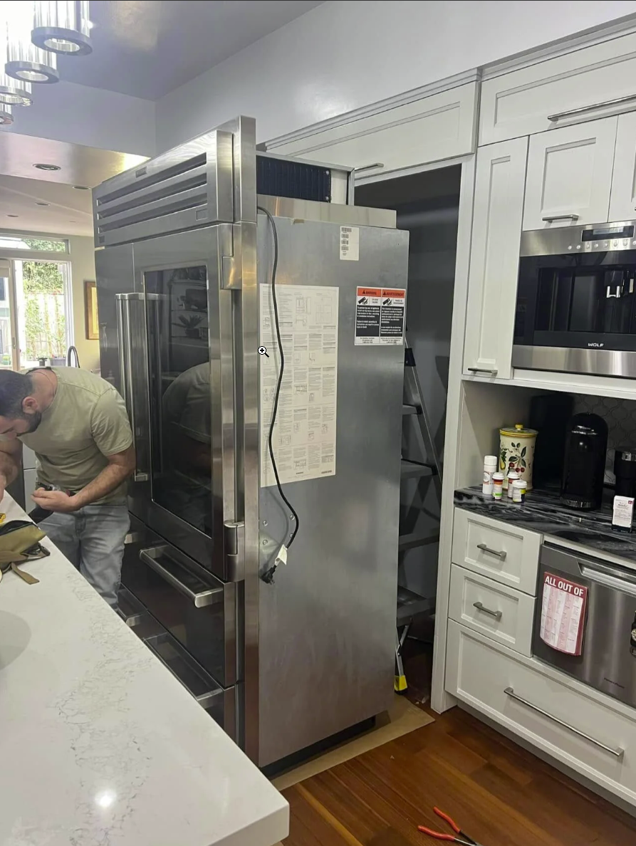 Built-in refrigerator installation in kitchen