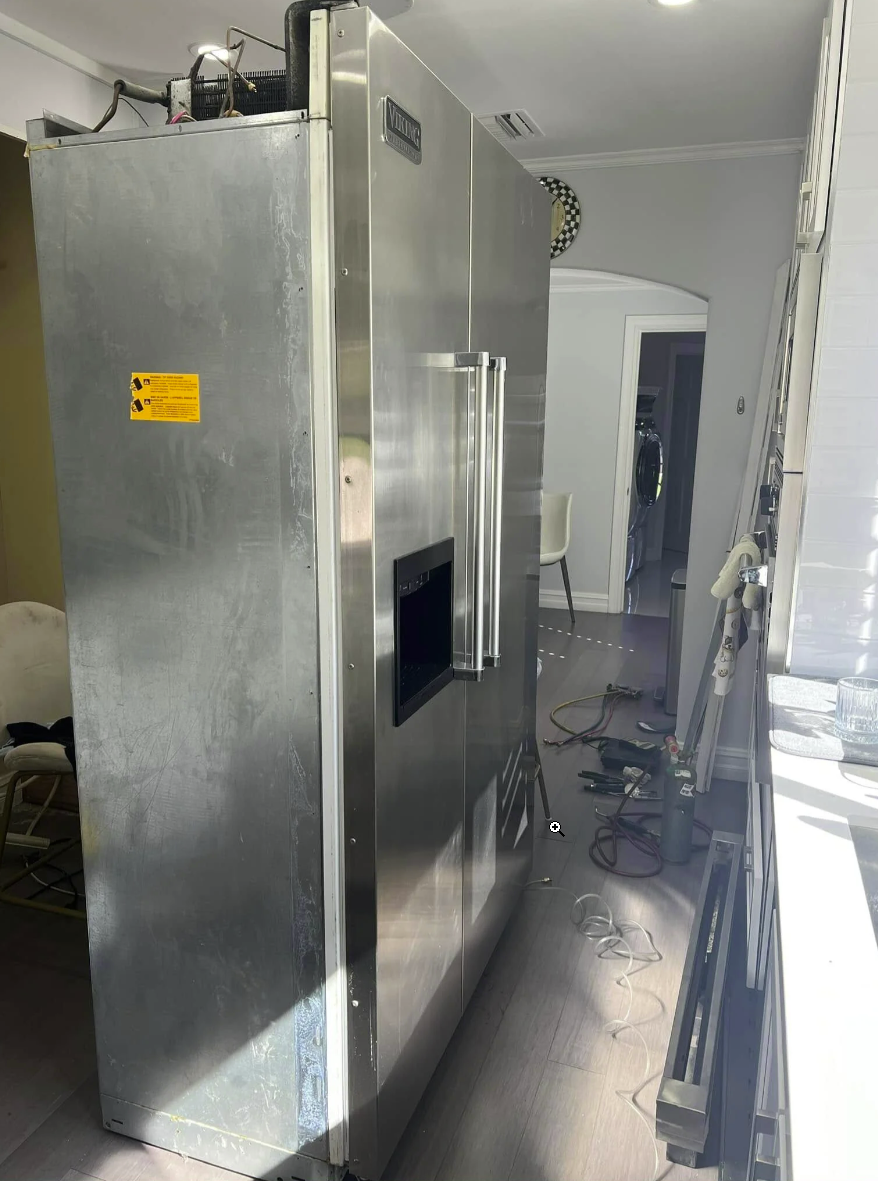 Commercial refrigerator repair with exposed back panel