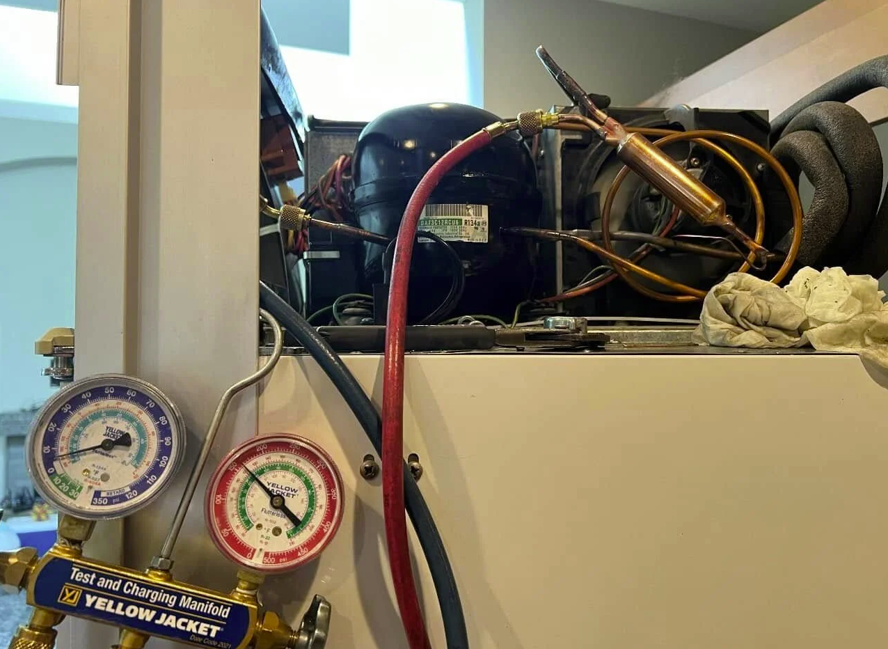 Refrigerator compressor repair with diagnostic gauges